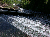 Water flowing down steps in the post aeration phase of wastewater treatment