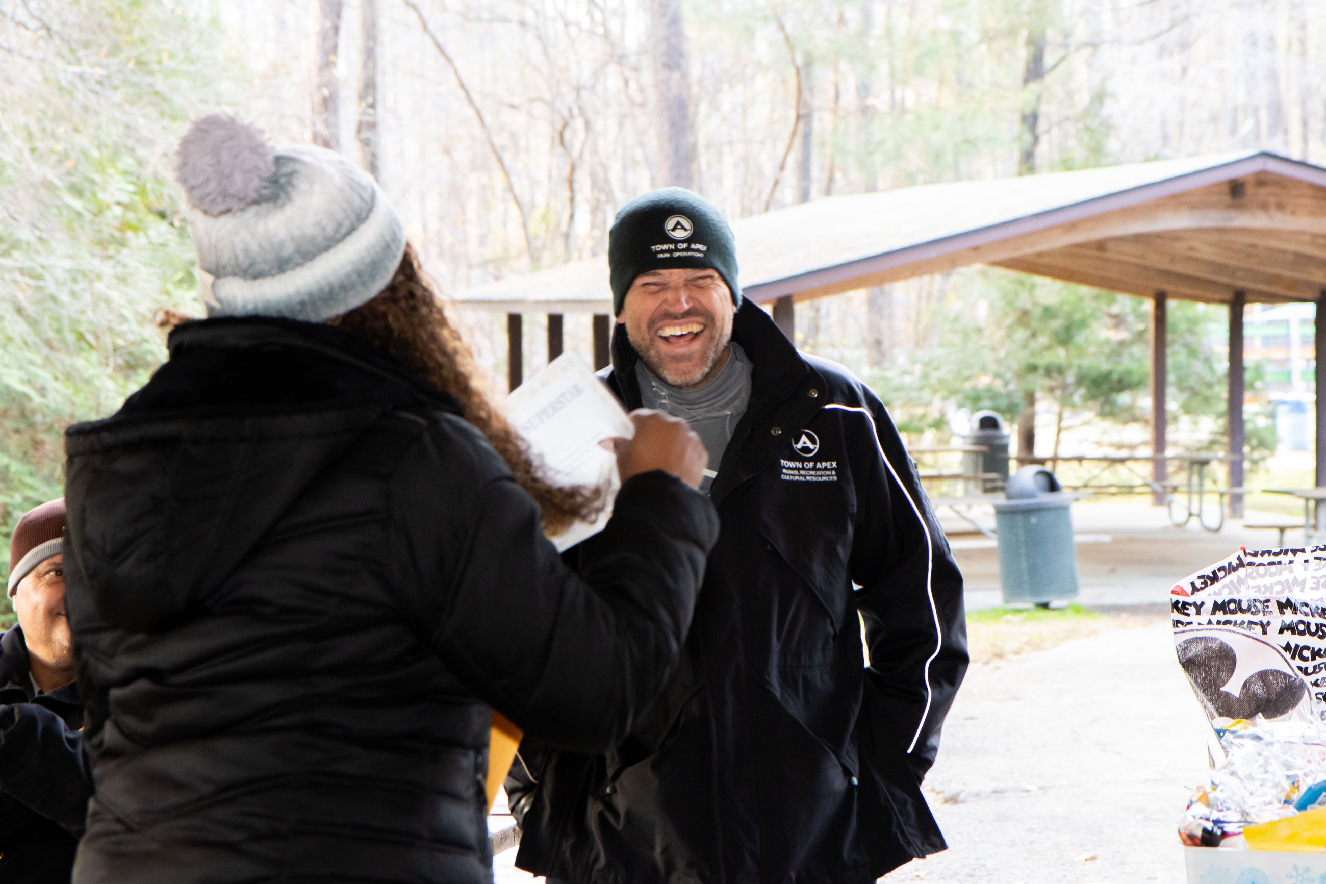 Employees laughing at the 2025 Parks and Recreation Team Building Event 